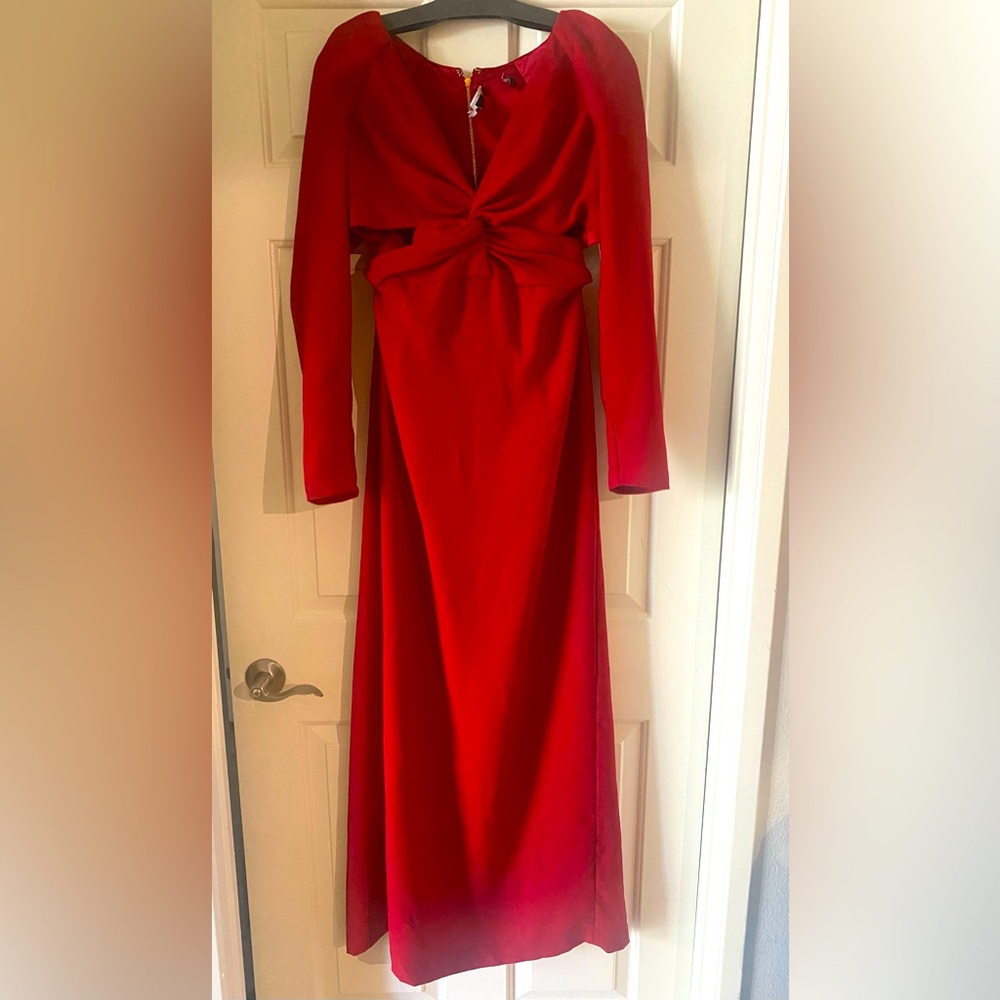 Burgundy red long sleeve Marciano gown with cut out around the waist